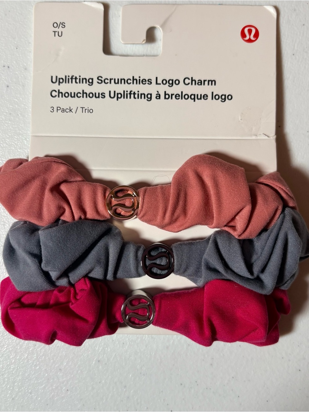Lululemon Uplifting Scrunchies logo charm 3 pack.